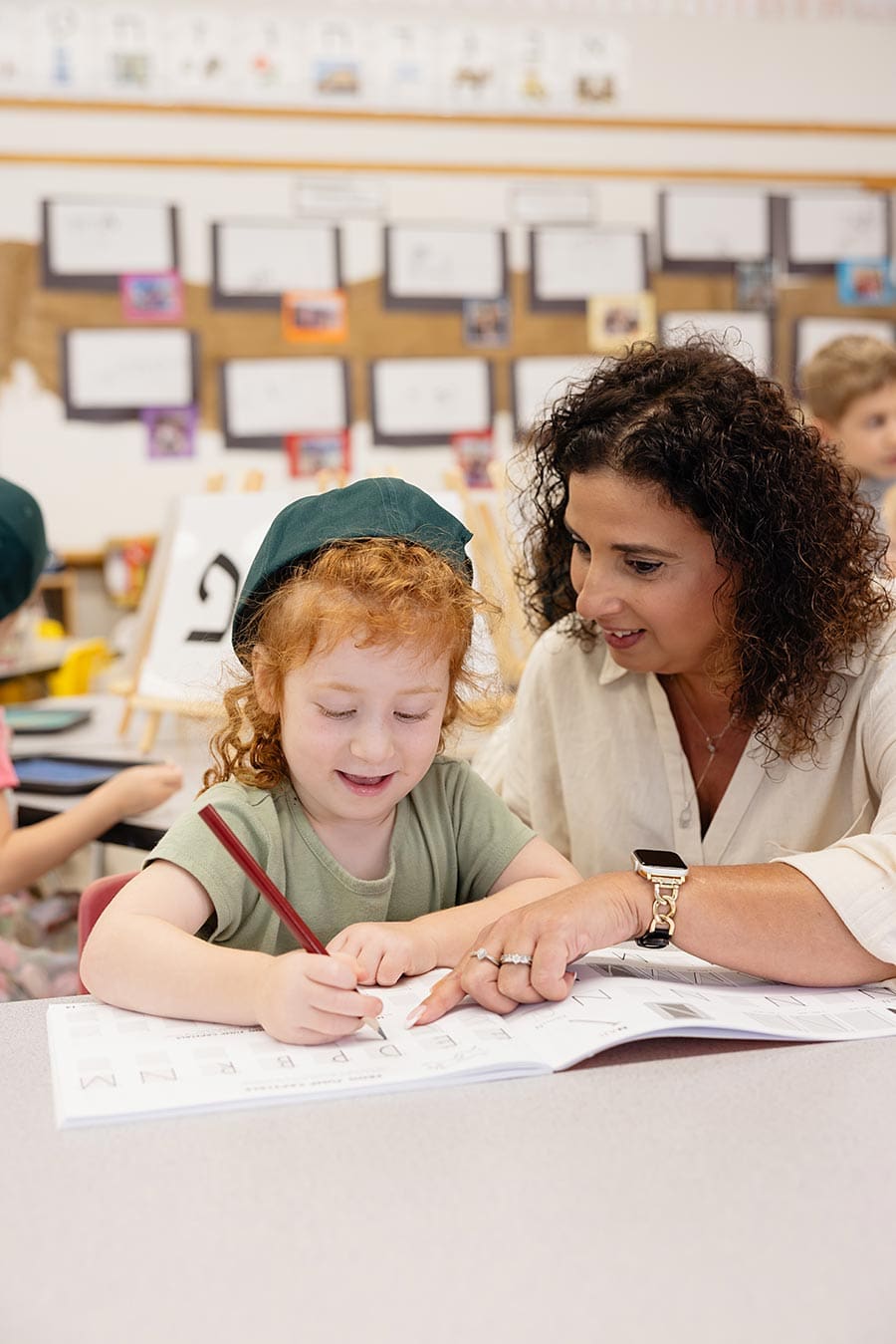 Early years teacher and student